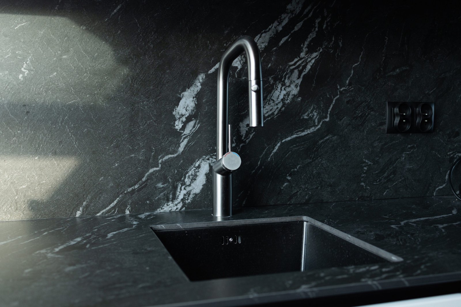 stylish black kitchen sink with elegant chrome faucet dark marble countertop minimalist scaled