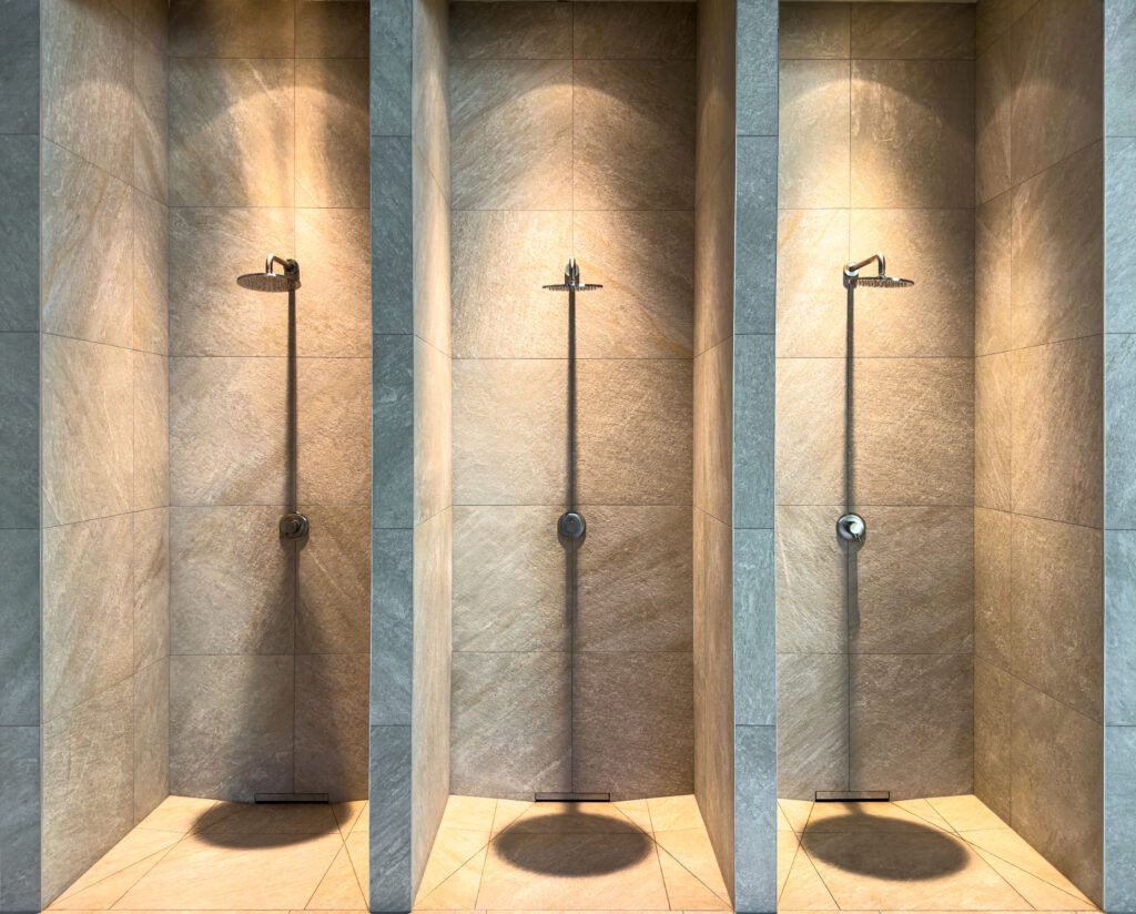 three shower niches ambient light stone minimalism